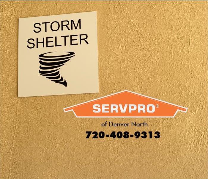 A “tornado shelter” sign is shown guiding building residents to safety.